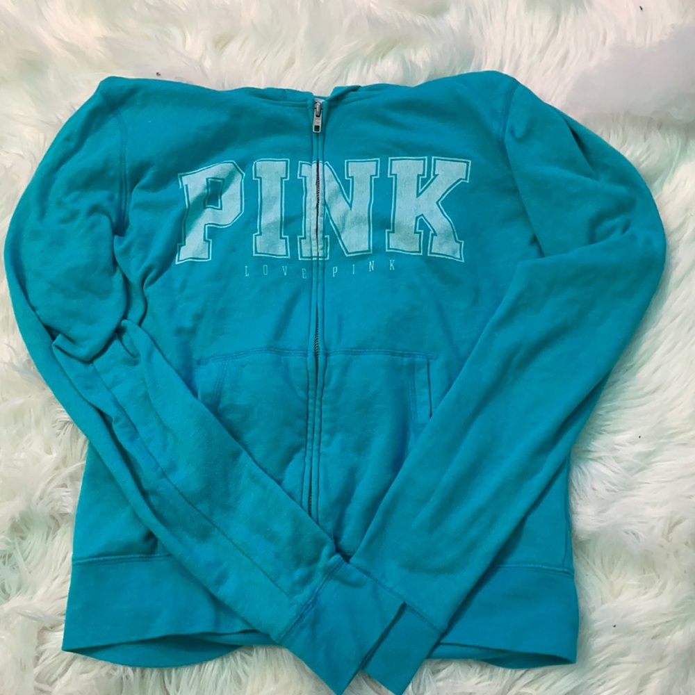Blue zip up pink jacket